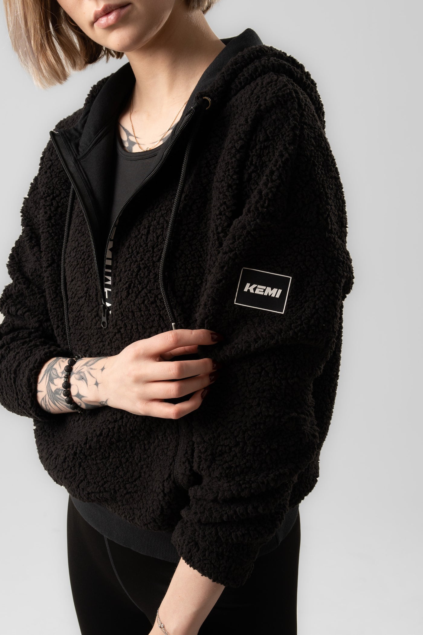 TOPSPIN SHERPA SWEAT IN BLACK