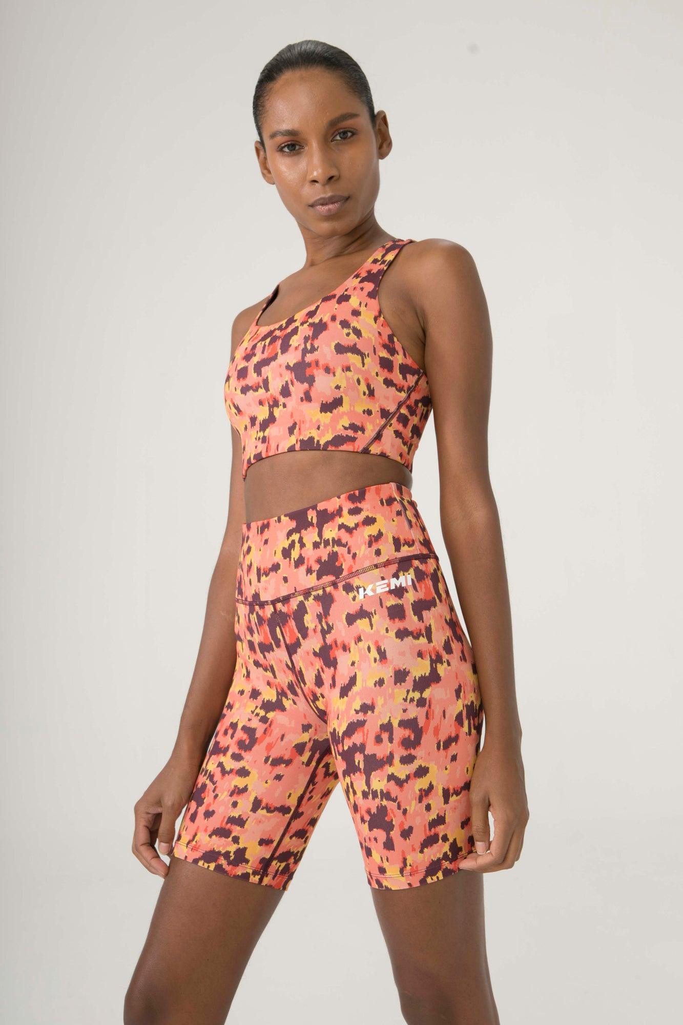 OFF COURT BIKER SHORT IN ORANGE LEOPARD PRINT - Kemi Active